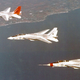 A trio of F-14 Tomcat prototypes demonstrate the range of the Tomcat’s wing sweep during a formation flight in 1972 (US Navy)